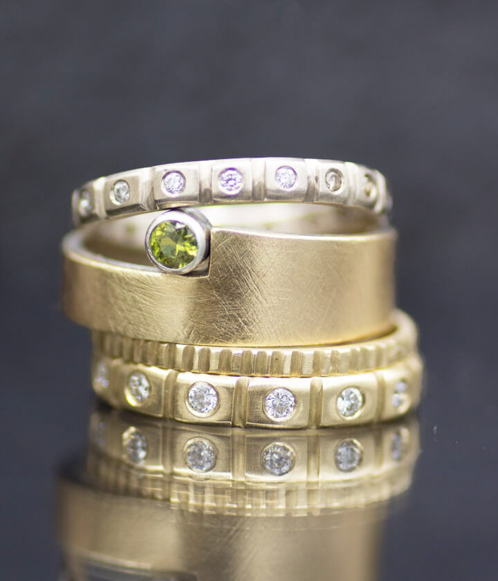 green sapphite cut out ring stack