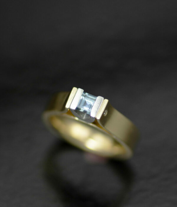 Blue Montana sapphire 14K gold and platinum canyon minimalist engagement rings