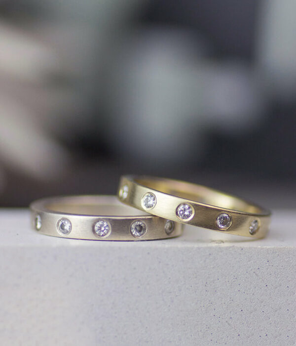 white and yellow gold eternity bands