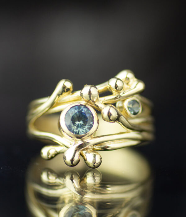 Side View Two Stone Branches Ring In 14k Yellow Gold With Blue Montana Sapphires Scaled