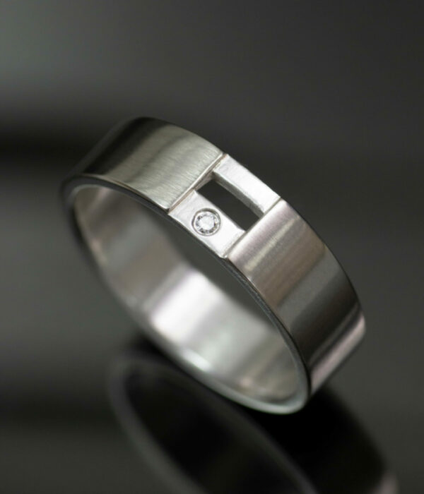 white gold and silver two band gap ring with diamond