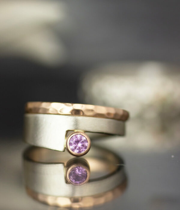 purple sapphire cut out with faceted band  e