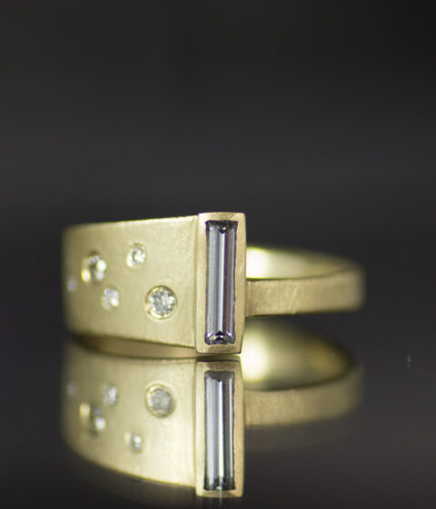 14K gold asymmetrical salt and pepper diamond wrap alt engagement ring with grey moissanite baguette
