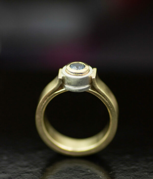 double bezel canyon platinum and 14K gold mixed metals modern engagement ring with Montana sapphire or lab-grown diamond
