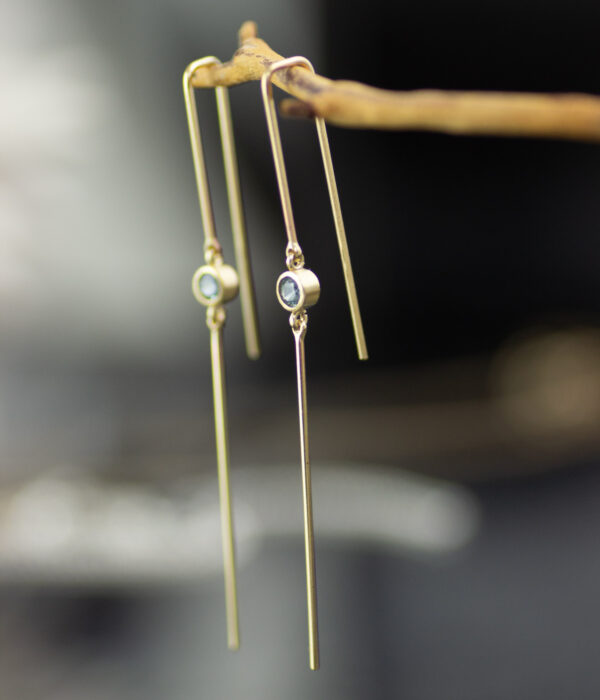 Sticks And Stone Gold And Sapphire Dangle Earrings In Yellow Gold Close Up Scaled